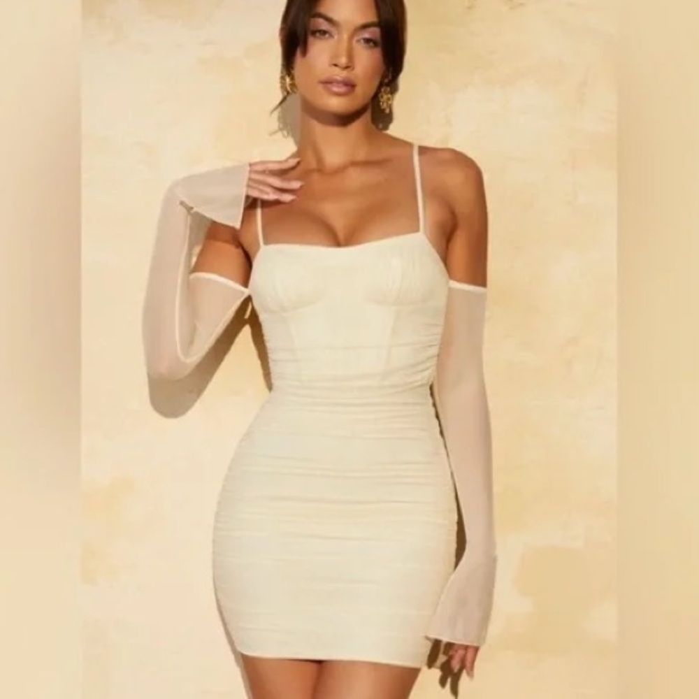 Off Shoulder Ruched Bust Mini
Dress in Beige